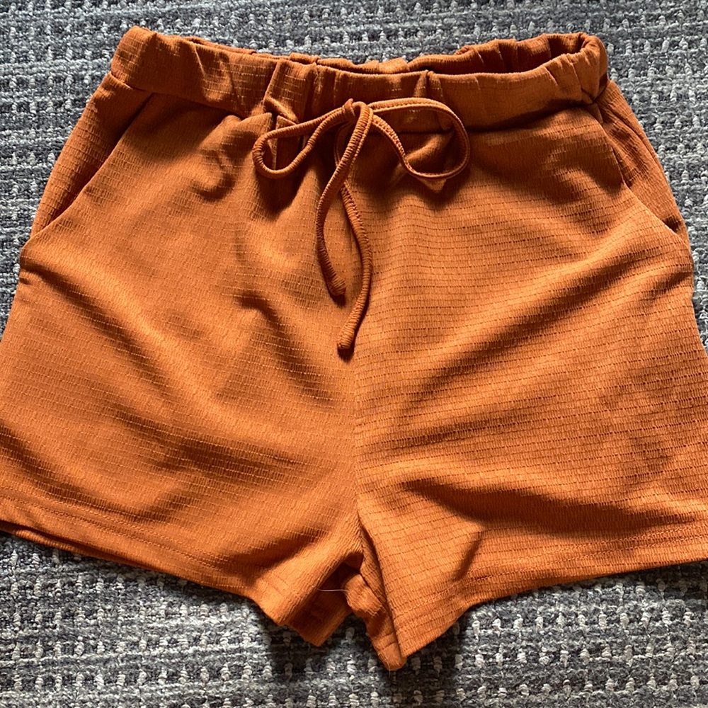 SHEIN small orange textured shorts